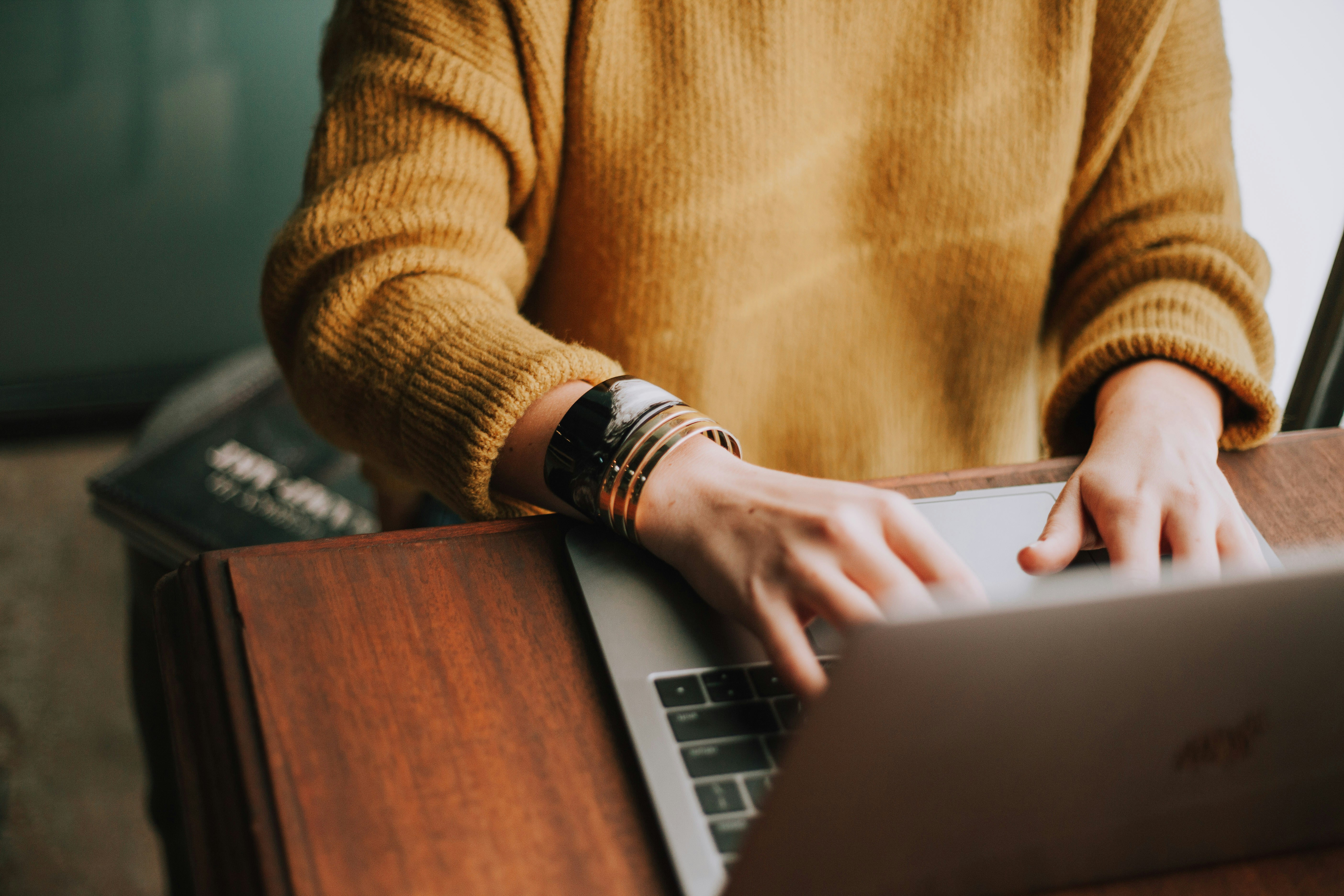 Modern web development trends 2025 - coding on laptop with futuristic interface
